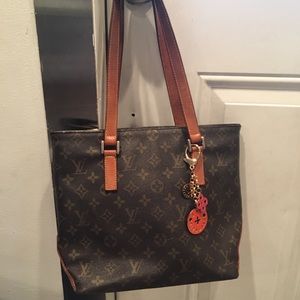 Louis Vuitton bag. Make me an offer.